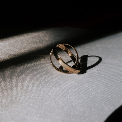 A metal scarf ring with a shadow
